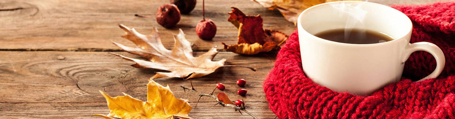 floor with leaves and coffee mug