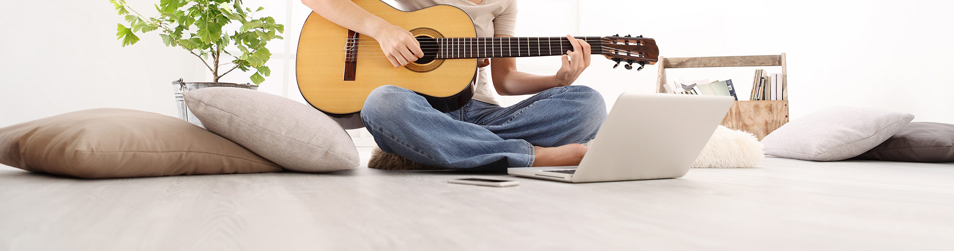 Guitar player on floor
