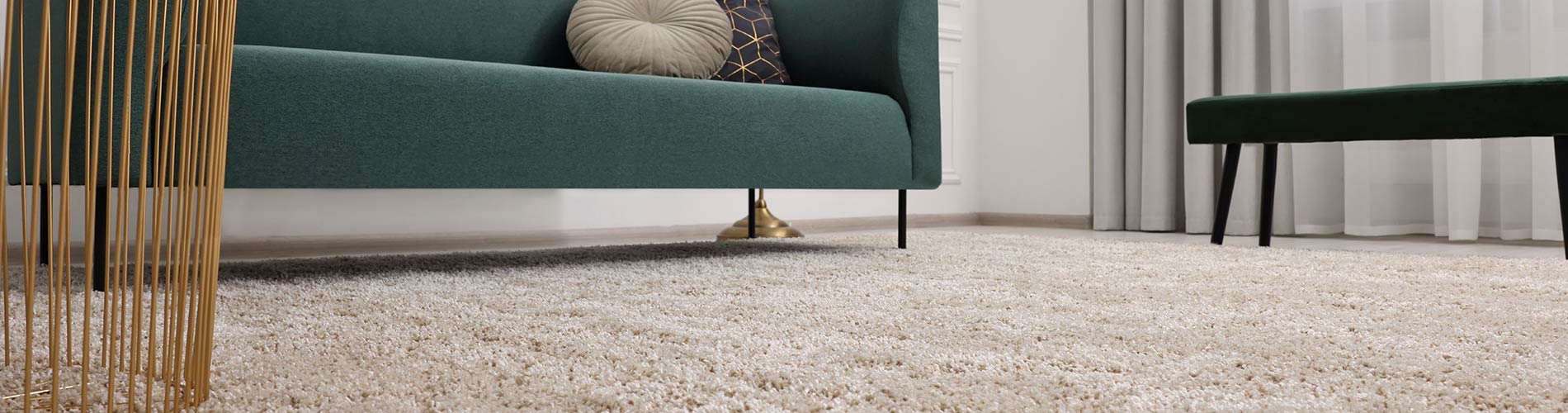 Carpet and green sofa
