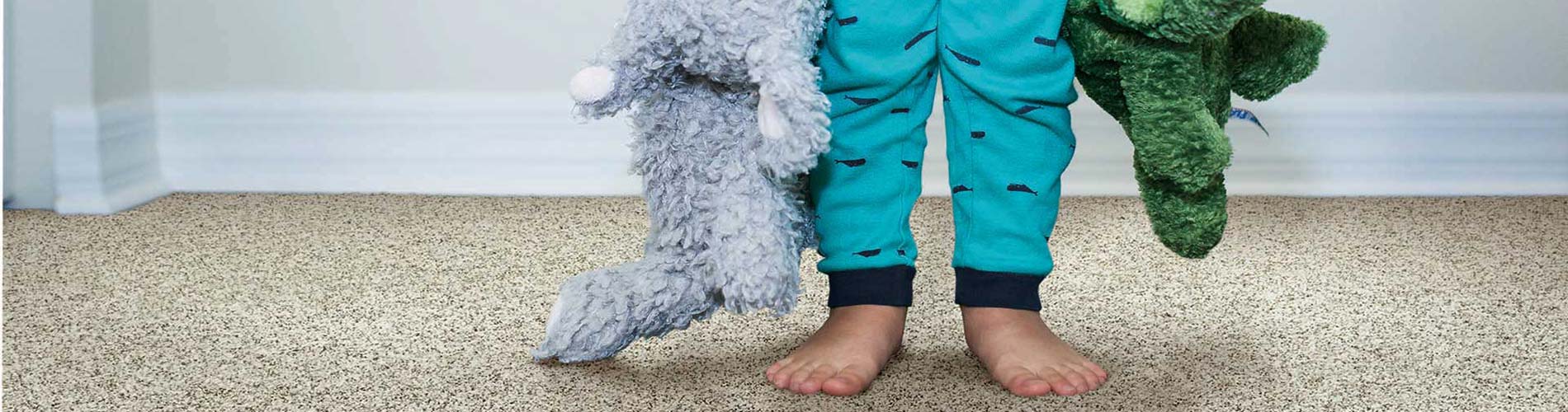 Kid standing on carpet