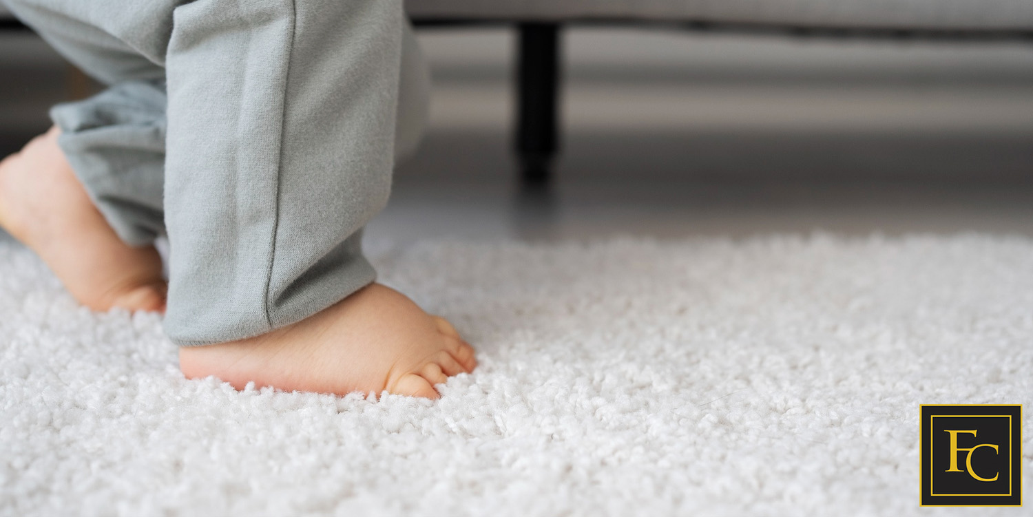 child on carpet