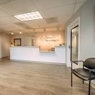Reception area at Burke Dermatology with wood-look luxury vinyl plank flooring