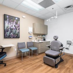 Exam room at Burke Dermatology with wood-look luxury vinyl plank flooring